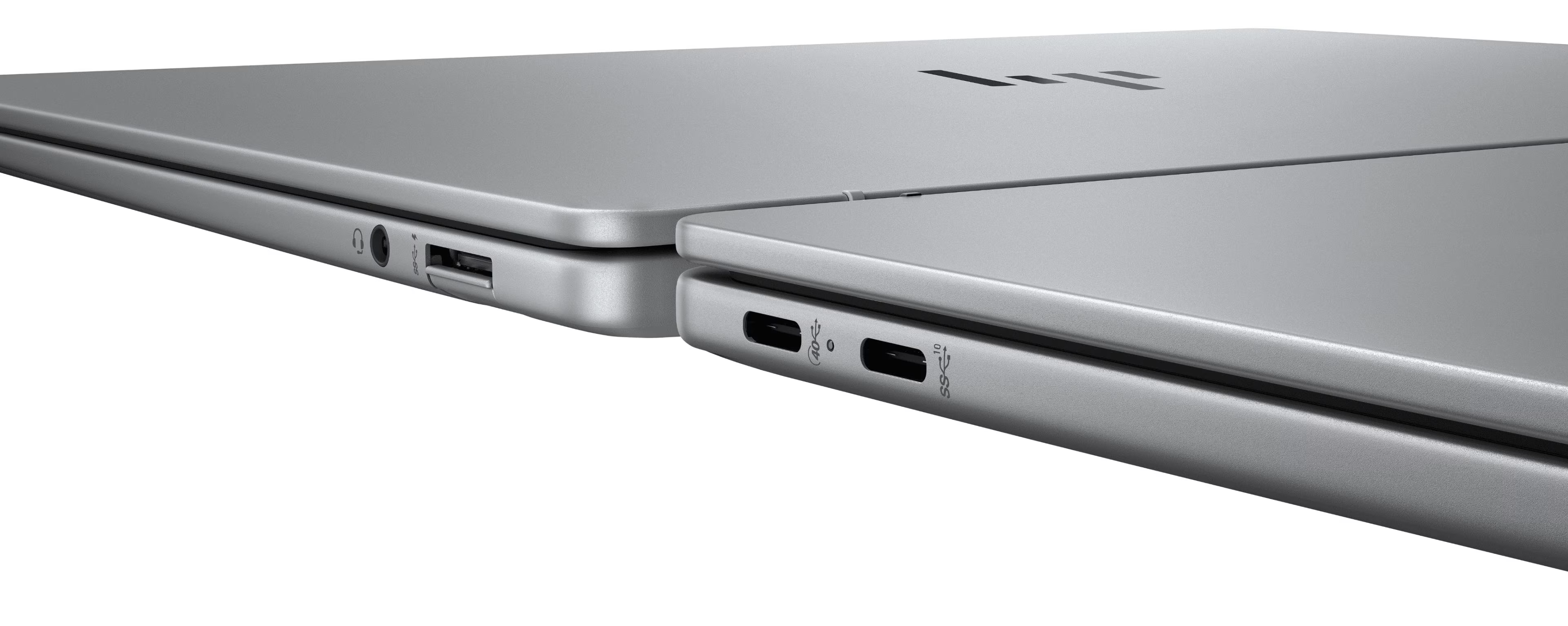 閉じた状態で互いに背を向けている2台のHPノートパソコン